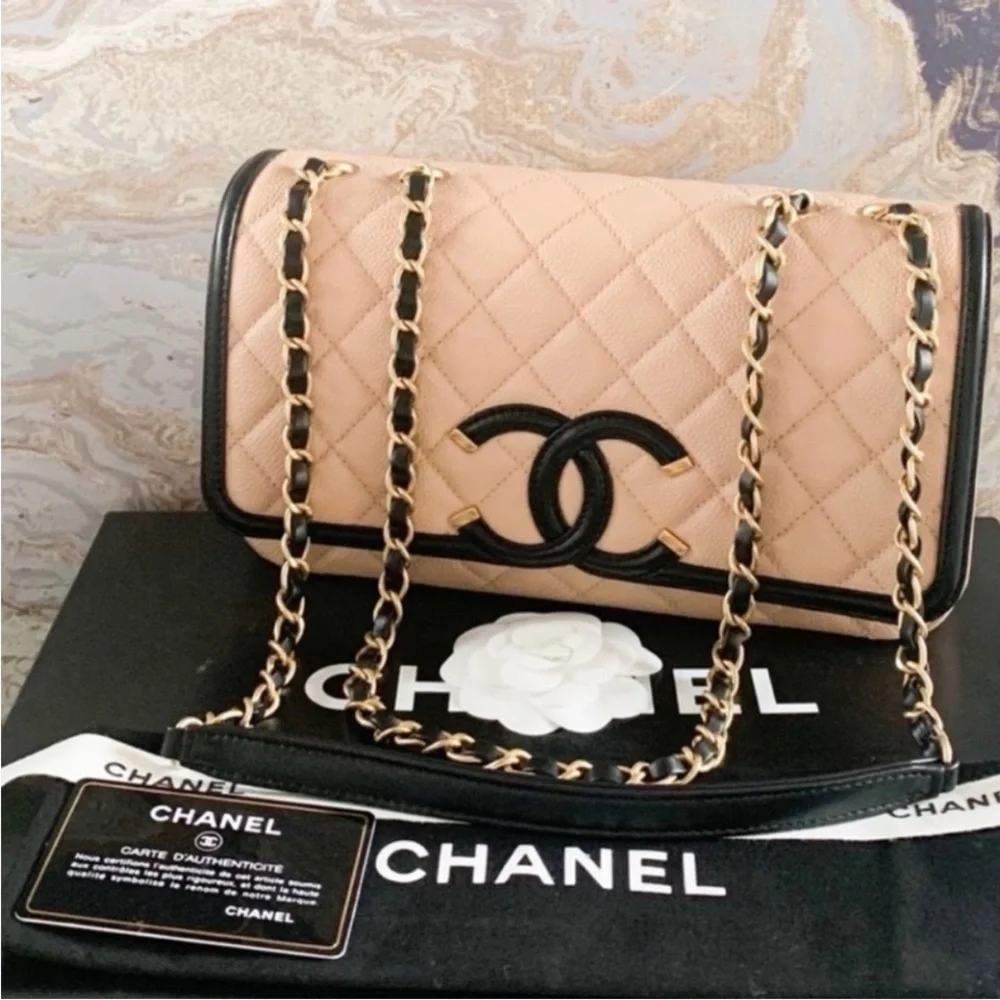 Authentic Chanel Medium Filagree Quilted Leather Bag